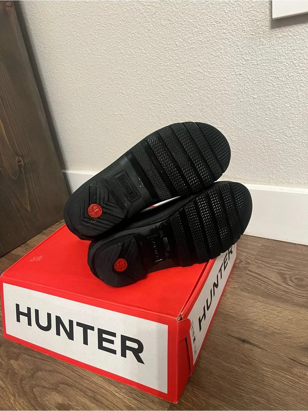 Hunter Women’s Black Chelsea Rain Boots with Red Logo